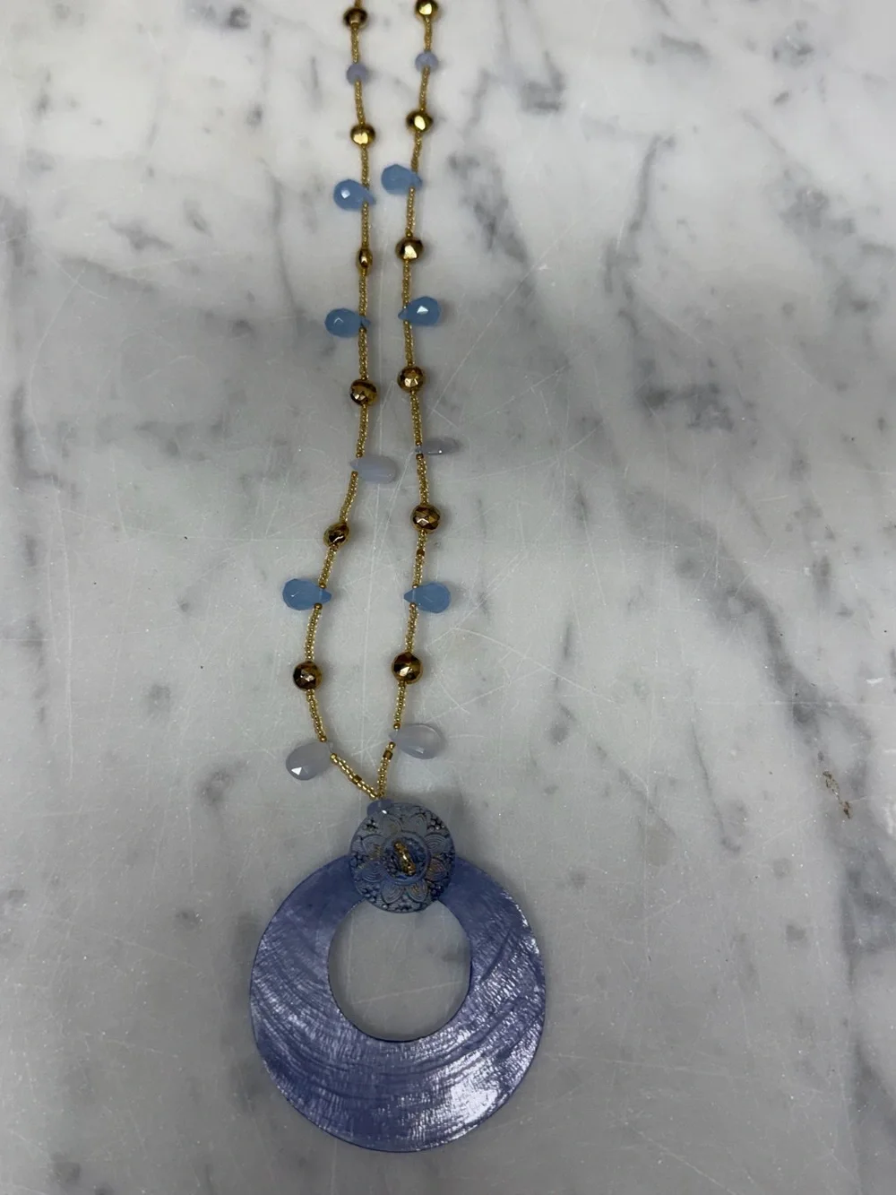 Blue Disc Pendant Necklace with Gold and blue Beaded Chain